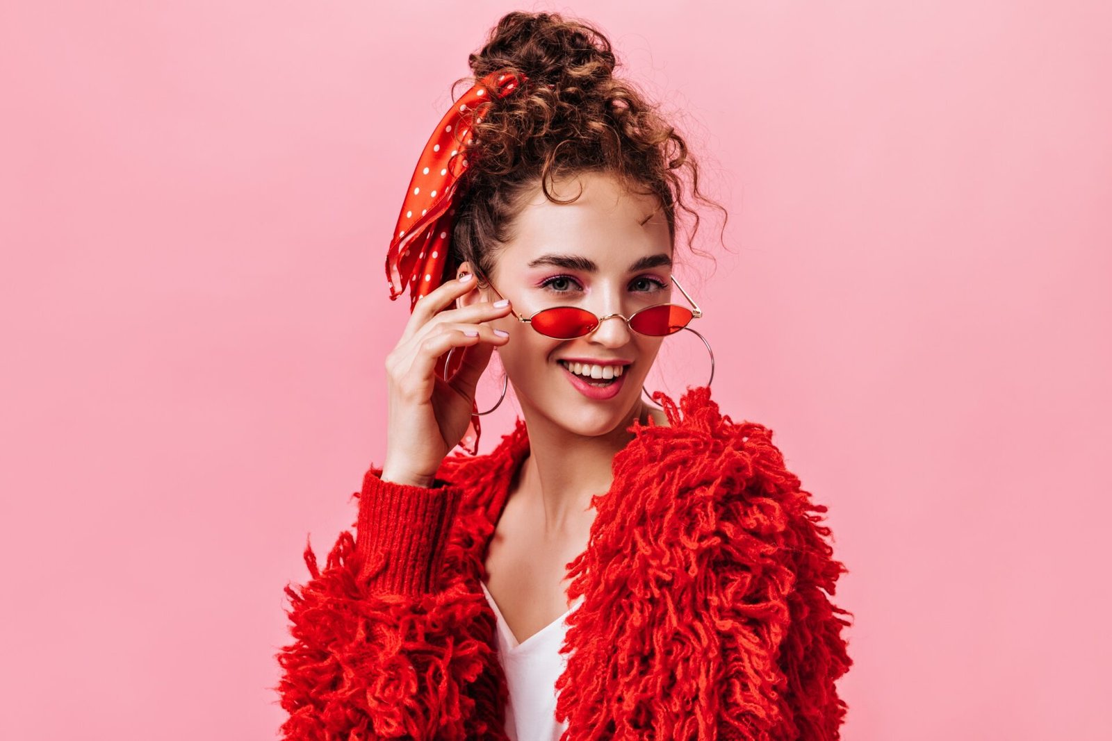 portrait-of-pretty-lady-in-red-warm-jacket-and-stylish-eyeglasses